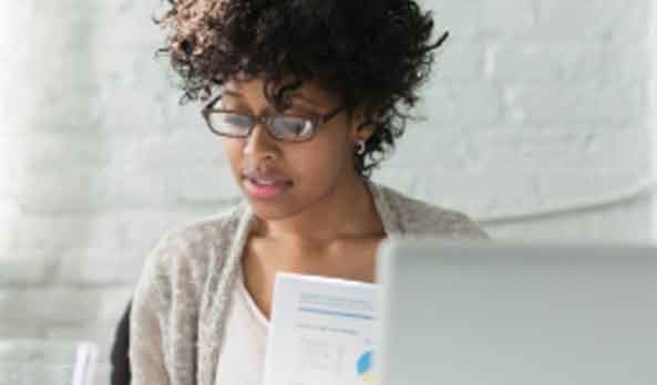 Woman paying her bill